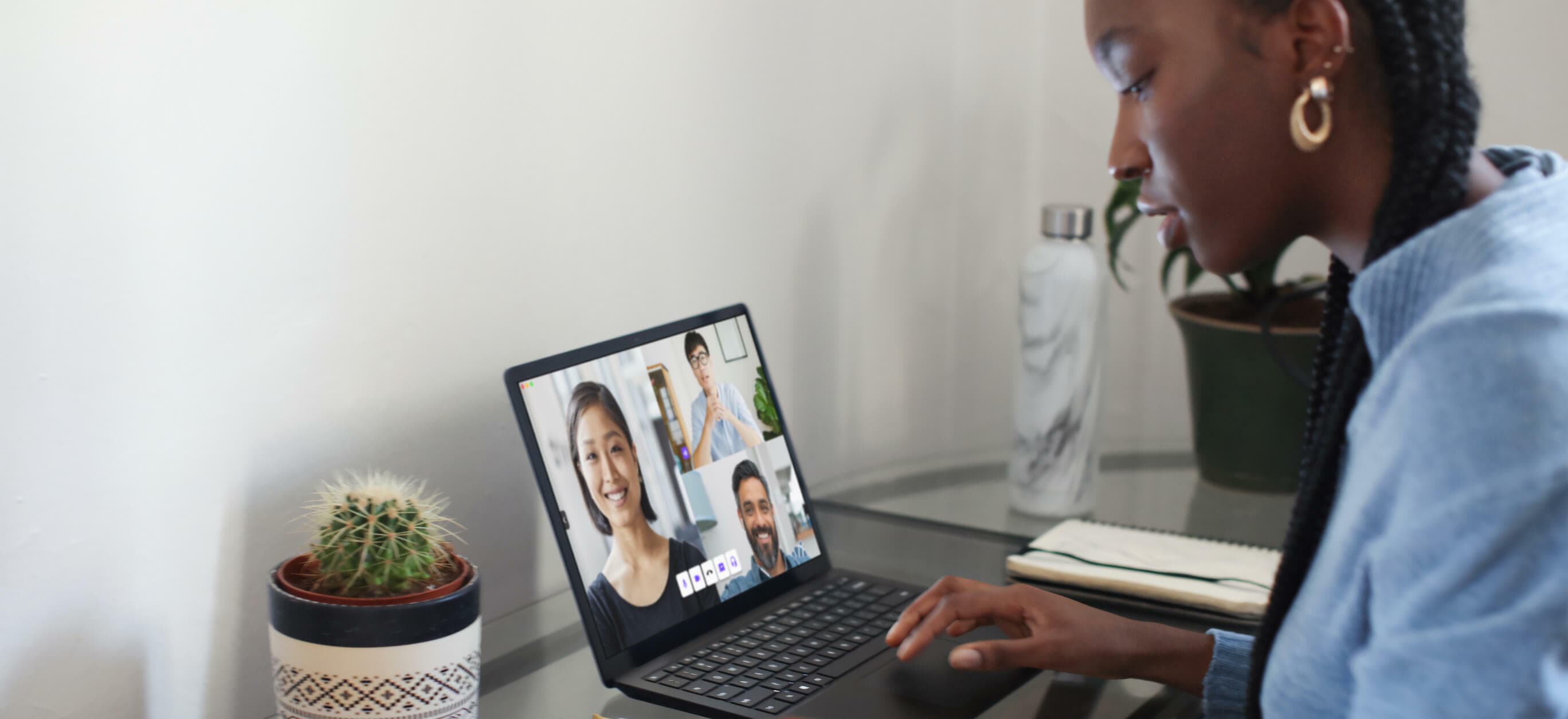 Woman on a Dialpad meeting from the computer