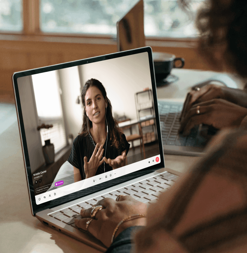 Two people on a video conference meeting