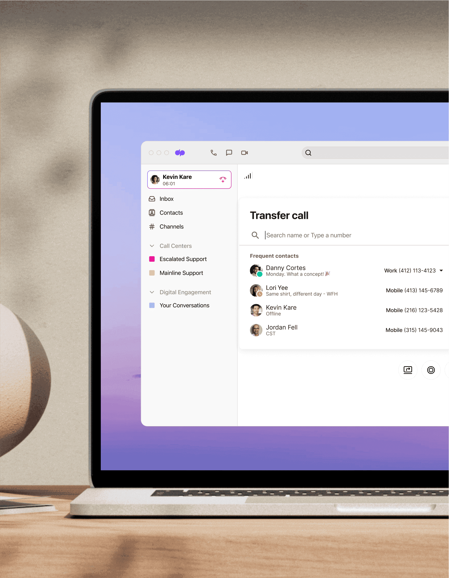 Computer monitor showing Dialpad's dial by name directory interface