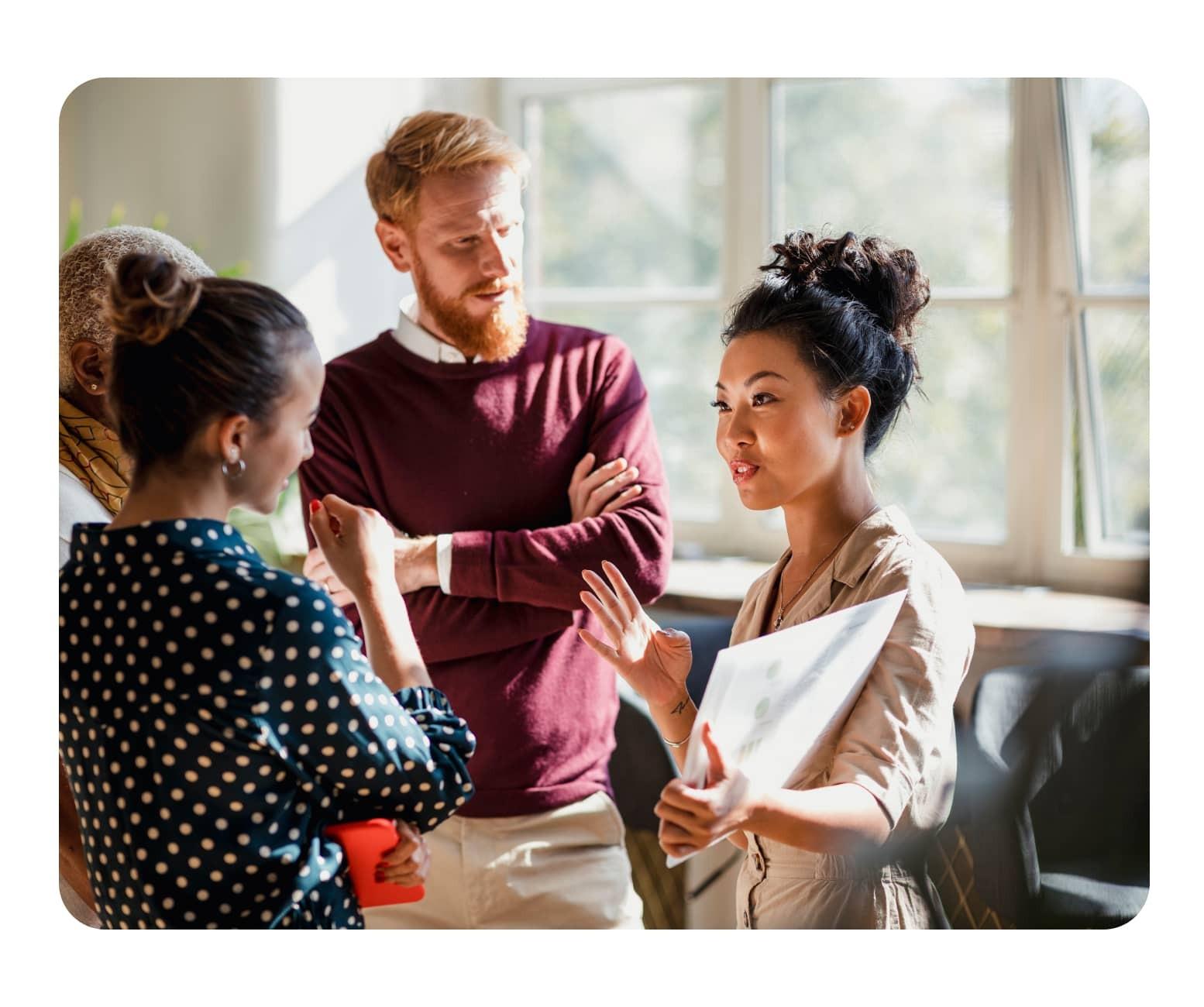 Four colleagues discussing