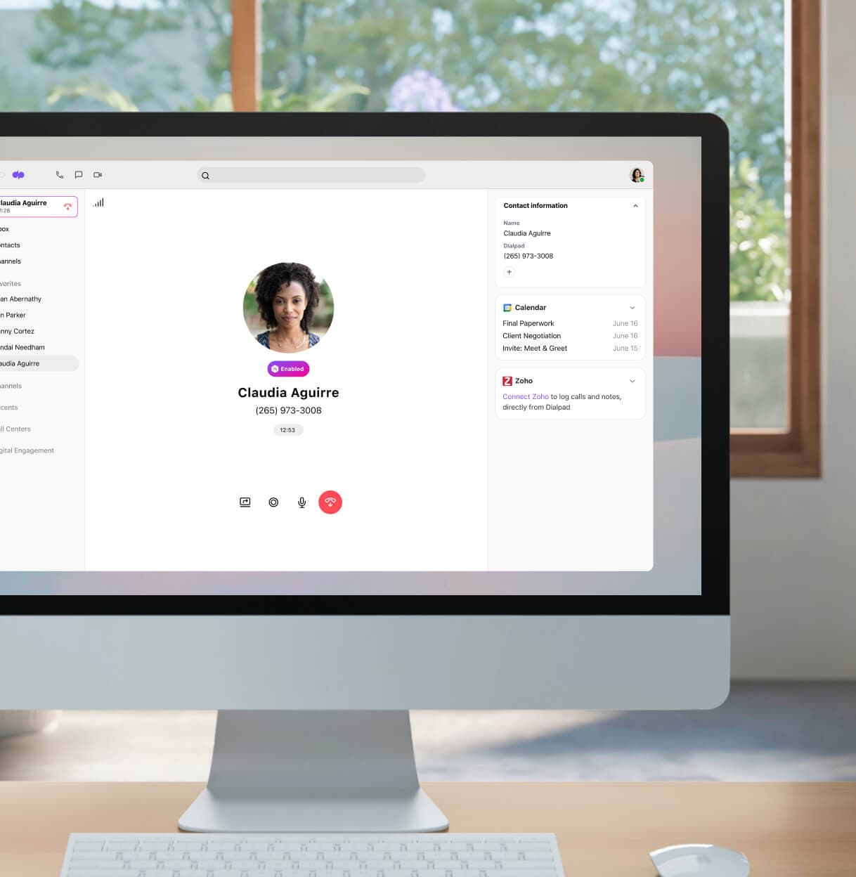 A computer showing a screenshot of Dialpad integration with Zoho