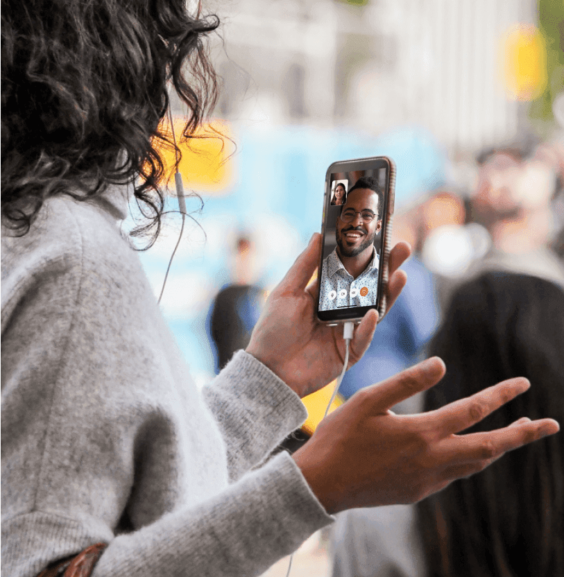 A lady videocalling another person on the phone