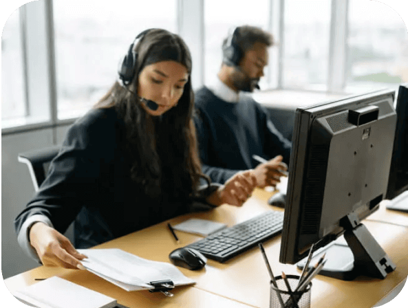 Two contact center agents at work