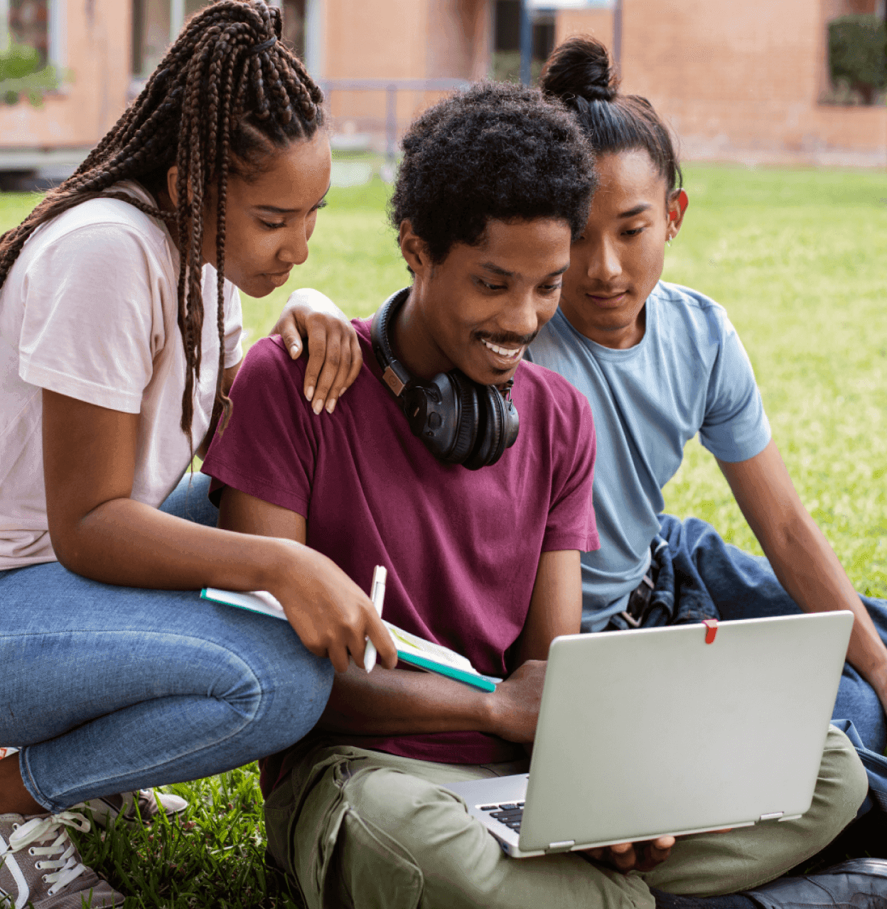 Students viewing a laptop